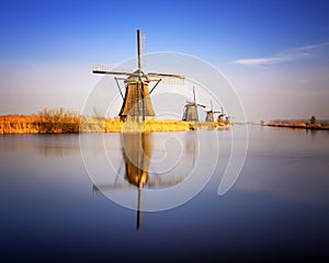 Sunset view at typical windmill at Kinderdijk, Holland.