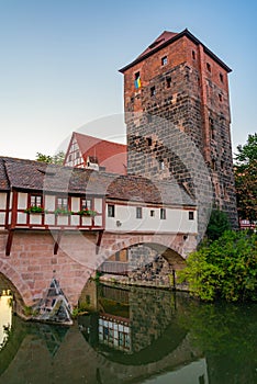 Sunset view of Weinstadel building, water tower, Henkerbrucke br