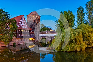 Sunset view of Weinstadel building, water tower, Henkerbrucke br