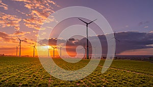 Sunset with view on wind turbines