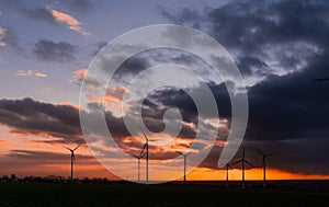 Sunset with view on wind turbines