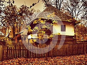 Sunset,the Village Museum-Wonderful old wooden house in park in autumn season
