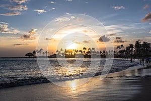 Sunset on Waikiki Beach, Oahu, Hawaii photo