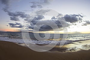 Sunset at Wailea with Ocean, Sand, Reflection, Clouds and Kahoolawe Island in Maui, Hawaii - USA