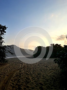 Sunset at the wasteland of beach