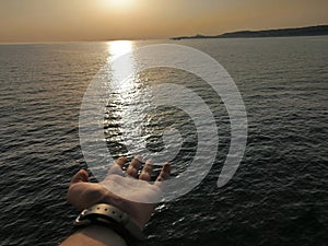 Sunset water sea hand nikon d3400 Huawei mate20 Marmara photo