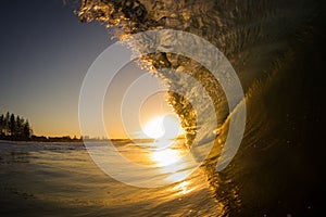 Sunset and the wave