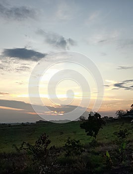 Sunset in the western sky at three degrees from equator.