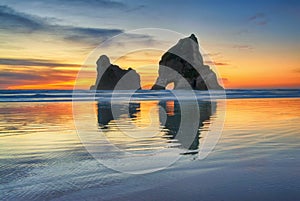 Sunset at Wharariki beach, New Zealand