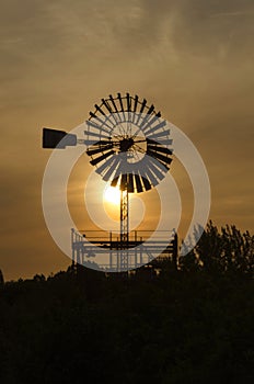 Sunset with windmill backlighting