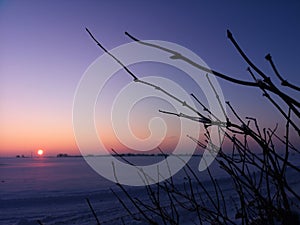 Sunset in winter fields