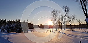 Sunset in winter and long shadows from trees