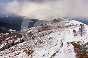 Sunset in winter mountains with dramatic light