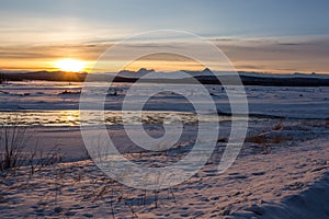 Sunset in winter over Tanana river