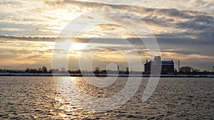 The sunset in winter on the river