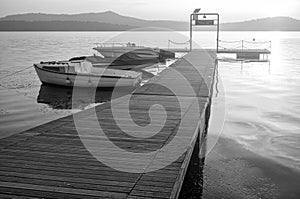 Sunset over the waters of Viverone Lake Piedmont, Northern Italy.Black and white photo photo
