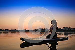 Sunset, Woman Silhouette on lake Stand Up Paddle Board SUP, Version 2