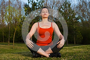 At sunset yoga meditation .