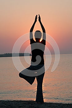 Sunset yoga posture photo