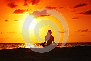 Sunset yoga woman