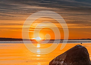 Sunset at Ytre hvaler national park in Norway photo