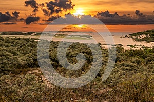 Sunset at The Zwin Nature Reserve, North Sea coast, Belgium-Netherlands border photo
