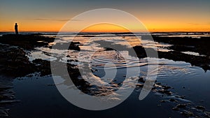 Sunsets and Surfers at Swamis Reef Surf Park Encinitas California.