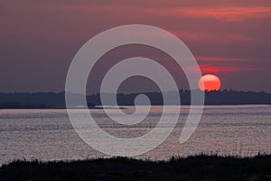 Sunsetting viewed from Pelican Watch on Seabrook Island photo