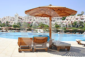 Sunshade and hotel pool