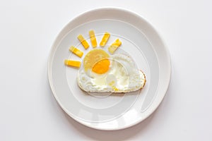 Sunshine fried eggs breakfast for kid on white background