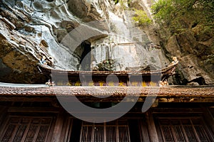 Sunshine hitting the ancient wooden temple roof at the Bich Dong Pagoda, Tam Coc