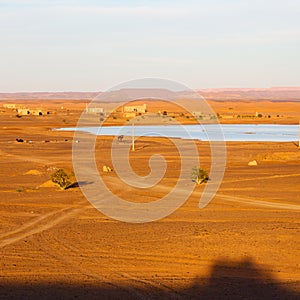 sunshine in the lake yellow desert of morocco sand and dune