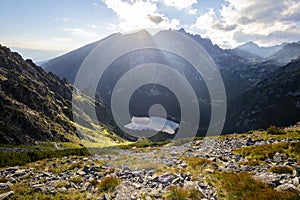 Sunshine over mountain lake