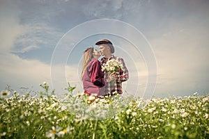 Sunshine portrait of happy couple outdoor in nature location at sunset, Warm summertime