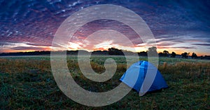 Sunshine rising over a tent