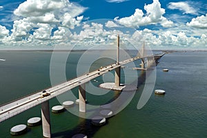 Sunshine Skyway Bridge over Tampa Bay in Florida with moving traffic. Concept of transportation infrastructure