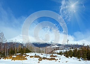 Sunshiny winter mountain Tatranska Lomnica, Slovakia