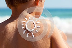 Suntan lotion at the beach photo
