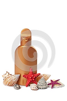 Suntan lotion and sea shells isolated