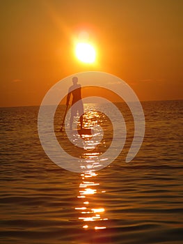 SUP - Stand Up Paddling in the sunset - Maldives
