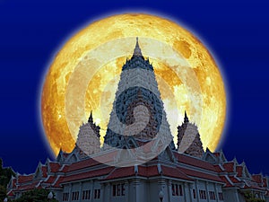 Super blood moon over Buddhagaya pagoda on night sky