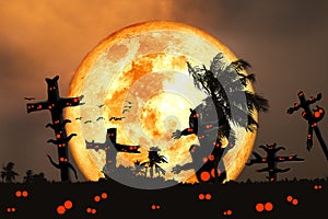 Super blood moon and silhouette coconut tree in the field and night sky with tomb and ghost