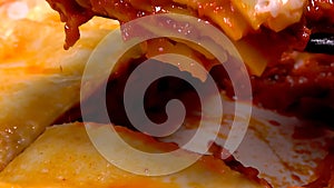 Super close-up a piece of the delicious lasagna