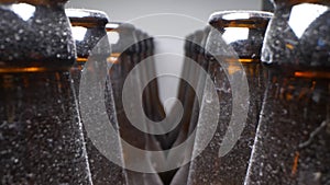 Super close up, rows of empty dusty brown glass bottles