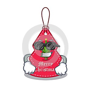 Super cool christmas tag hanging on mascot shape
