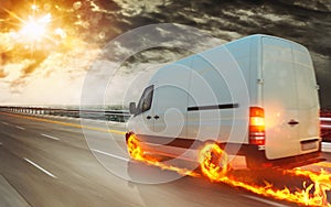 Super fast transportation service with a white van with wheels on fire