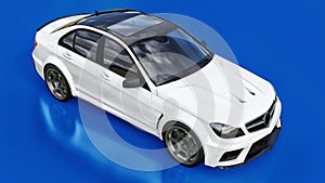 Super fast white sports car on a blue background. Body shape sedan. Tuning is a version of an ordinary family car. 3d