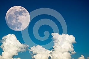 Super full moon with clear blue sky cloud daytime for background backdrop use