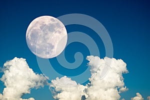 Super full moon with clear blue sky cloud daytime for background backdrop use