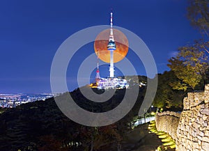 Super full Moon with Seoul tower in Seoul, South Korea.